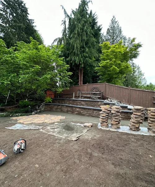 Installation of natural Grass, Retaining wall construction & Fire Pit in Lake Stevens 